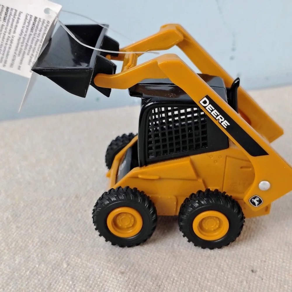NWT John Deere ERTL Skid Steer Loader Yellow Black Construction Farm Toy